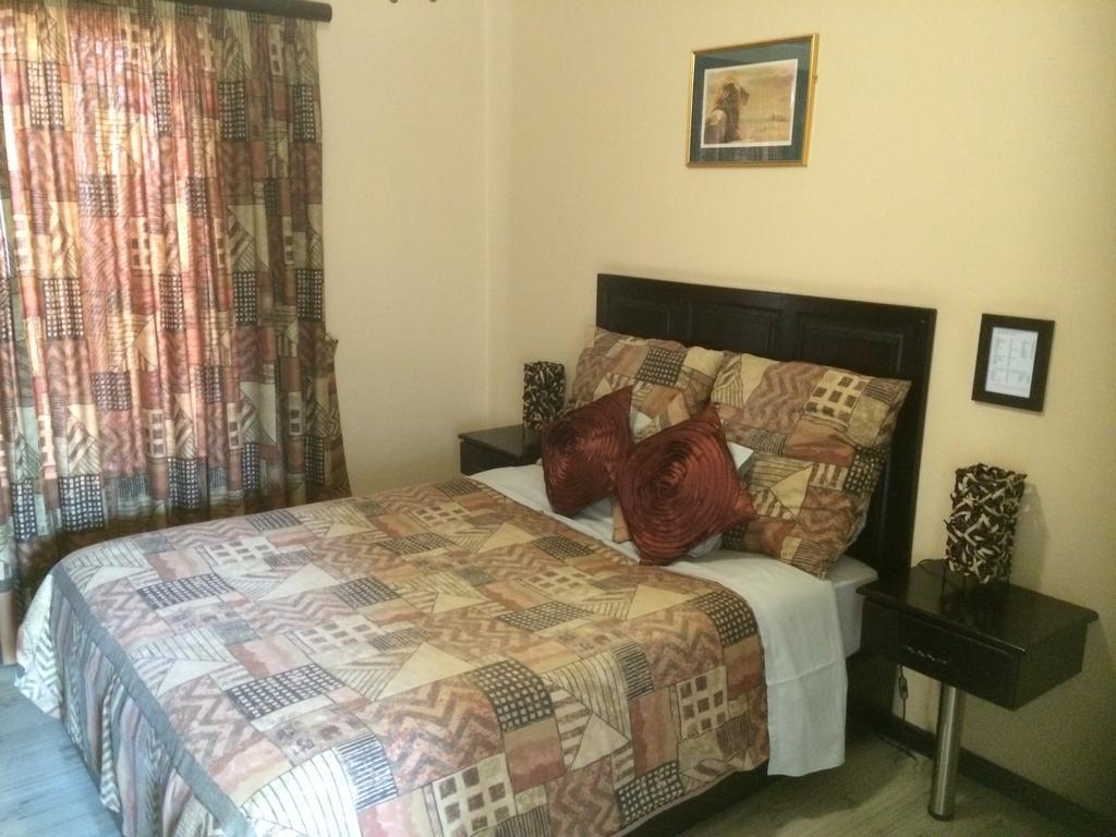 Auberge Guest Lodge Mbombela Quarto foto